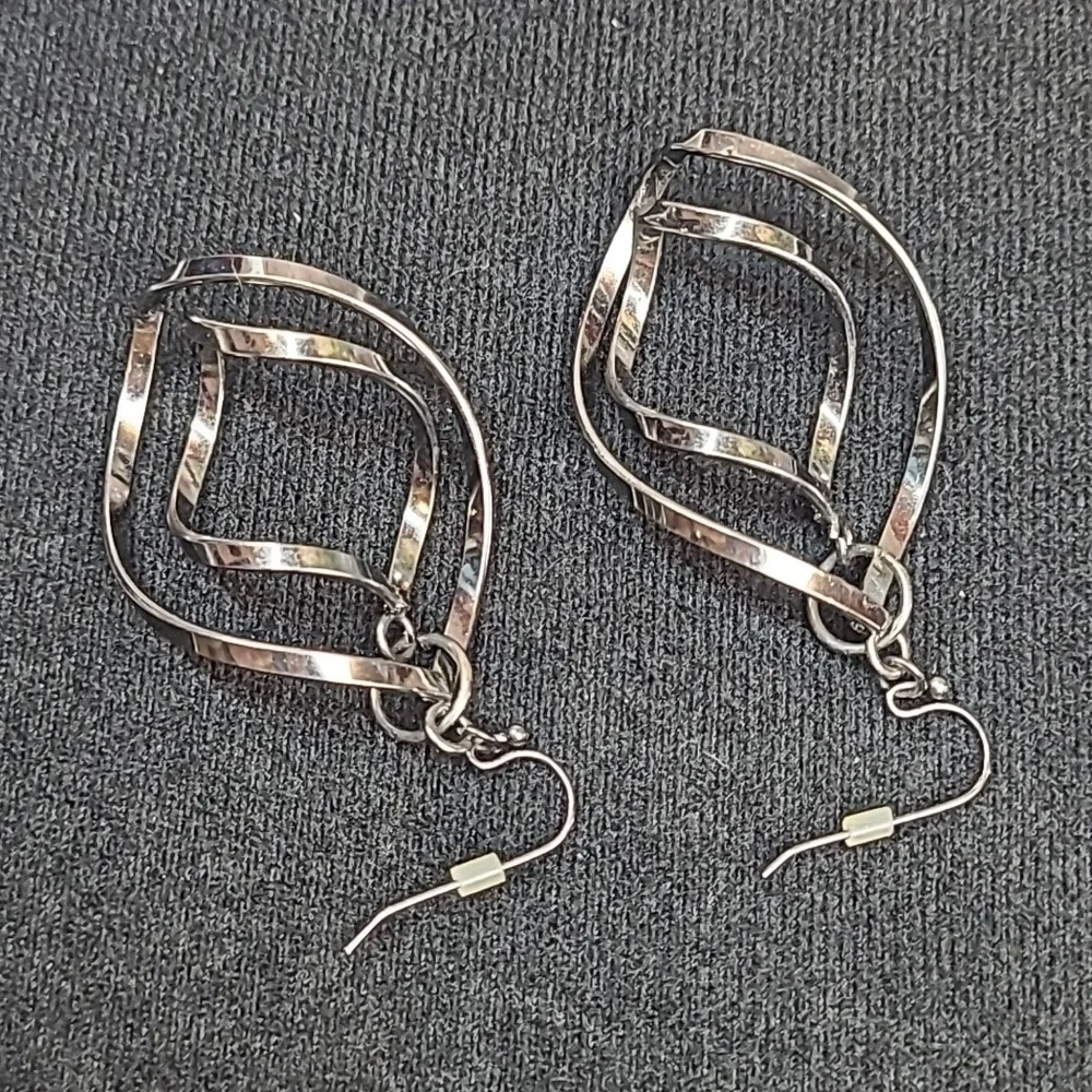 TWISTED SPIRAL PIERCED DANGLE EARRINGS